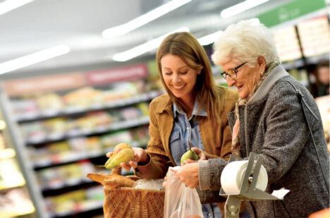 Two women grocery shopping